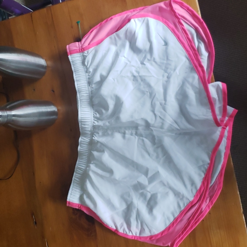 White/pink Nike Tempo shorts